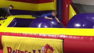 Blow up purple ball kid fail