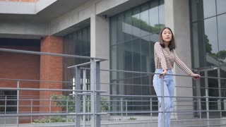 Young good looking girl watching around