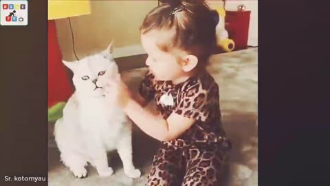 A cute baby and a cat - A baby and a cat play extremely funny