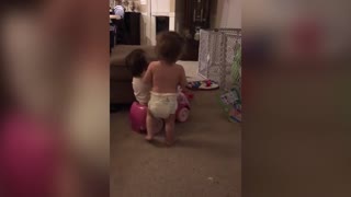 Twins Play with Toy Car in a Unique Way
