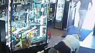 Store Owner Surprises Armed Robber