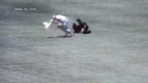 In 1976 Rick Monday Saves Flag Burning From Protestor