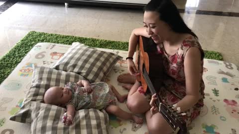 Mommy singing super sweet song for her baby