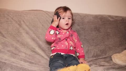 The_First_Phone_Call_of_a_Cute_Baby