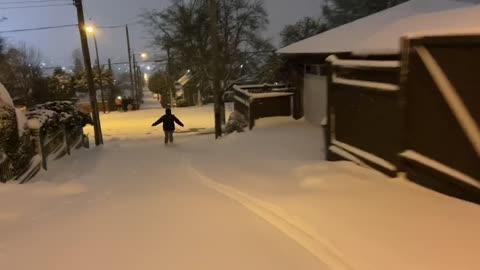Heavy Snow Turns Streets Into Ski Slopes
