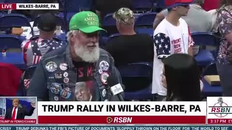 Patriot droppin red pills at Trump rally in Wilkes-Barre, PA