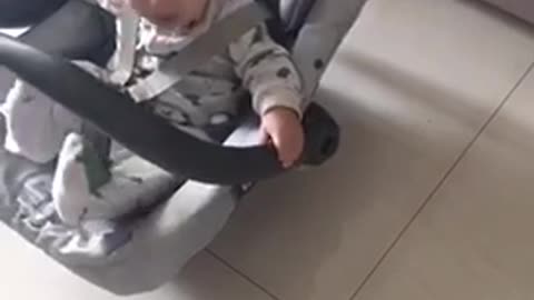 baby swinging alone