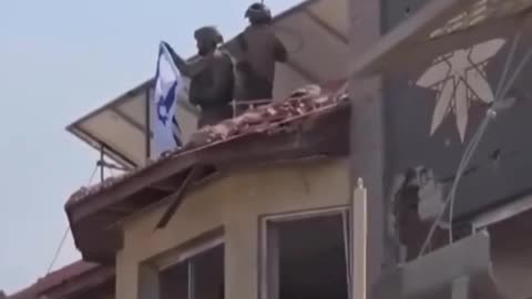 Breaking: IDF soldiers seen waving the Israeli flag in the Gaza Strip