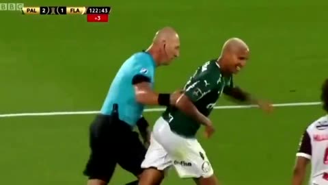 Brazilian player falls to the ground after touch from referee