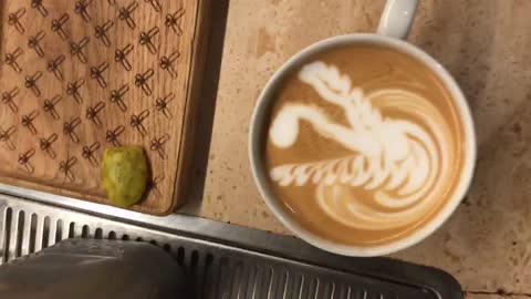 Barista Cliff executes a perfect swan 🦢 (latte art) in a flat white coffee