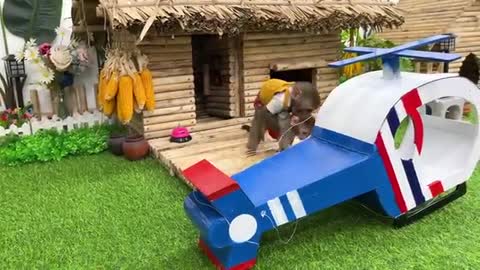 Bim Bim flies a helicopter with baby monkey Obi to harvest fruit