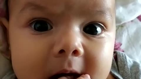 Cute baby, sucking little finger, too beautiful