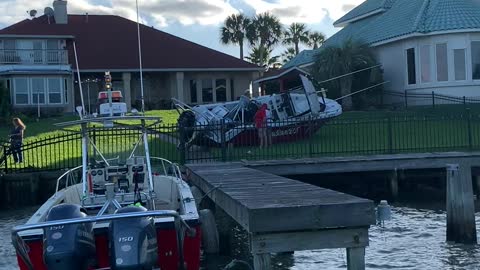 Crash Leaves Boat Beached in Backyard