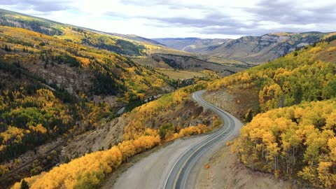 Winding Road Through Rocky Mountains