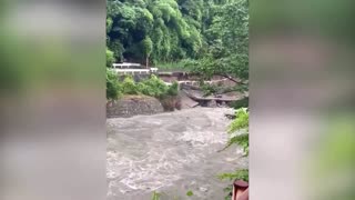 Swollen rivers after Typhoon Lan makes landfall in Japan