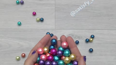 "Rolling Dice and Tumbling Marbles: A Satisfying Spectacle"