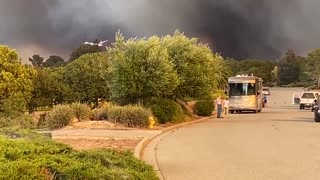 Fire retardant dropping from a T944 River Fire