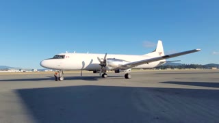 Convair 580 landing and taxiing to a stop at YYJ