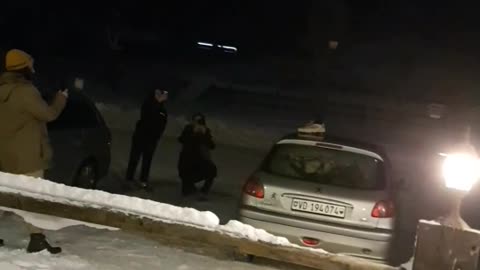 White shoes tries to jump off snow car falls on face