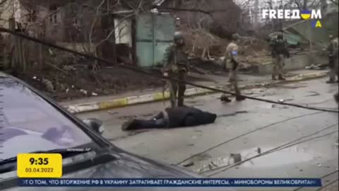 Ukrainian Army Soldiers placing Corpses in Bucha