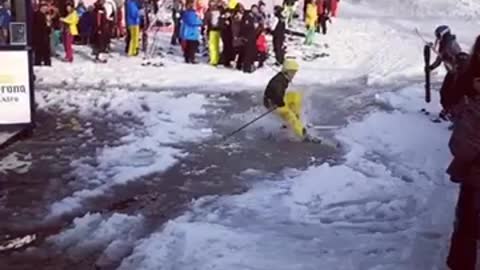 Yellow pants ski puddle slip