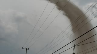 Whirling Tornado Spawns from Thunderstorm over Hidalgo