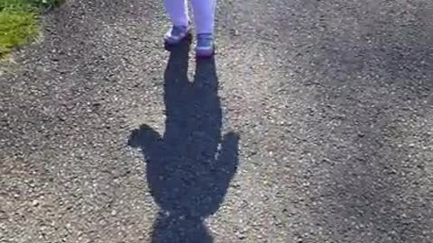 Baby terrified of her own shadow