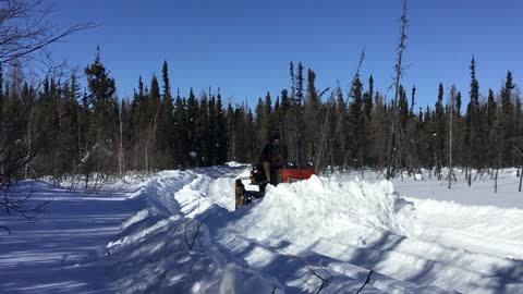 TD-6 IH Crawler plowing off an ice road march 17 2022