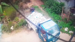 Truck Tumbles into a Pond