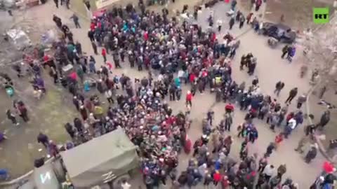 The Russian military distributing bread from its own bakery to residents of Markino