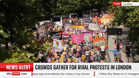 Crowds gather in London for rival protests led by Tommy Robinson and Jeremy Corbyn