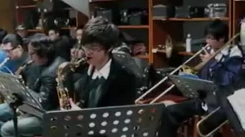Henry playing Tuba with a Chinese Orchestra in Nantong, China