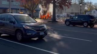 Burning Tesla car after a minor crash