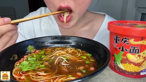 Dumpling noodle soup mixed with chili oil, 2 pieces of pork ribs and Chongqing