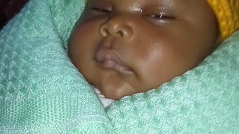 Cute Baby closes one eye when trying to sleep - Funny Baby