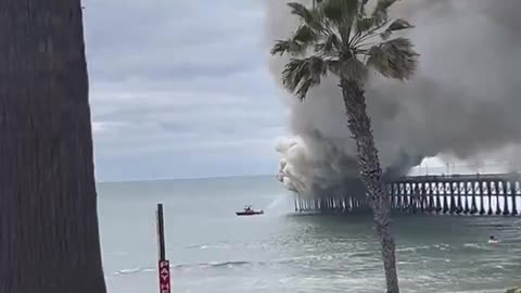 The historic Oceanside Pier in San Diego County, California is on fire.