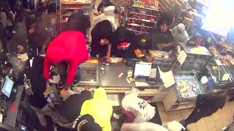 Flash Mob Goes Into Convenience Store And Destroys It