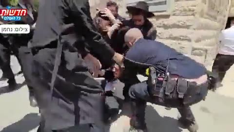 Israel police beating his own people
