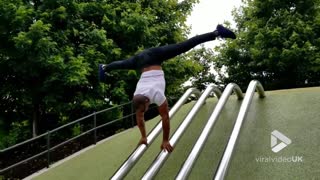 Walking handstand down a rail