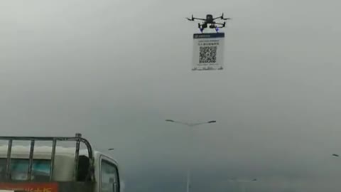 China - a police drone comes towards you on the highway… you need to quickly scan the QR code…