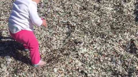 Baby Rolls Around At Sea Glass Beach