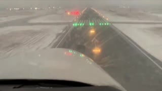 This is seen by the pilot landing during the snowstorm