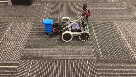 Picking up mini trash cans with a Vex robot!