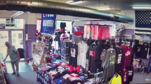 Guy crashes his vehicle into a store that sells Trump merchandise.