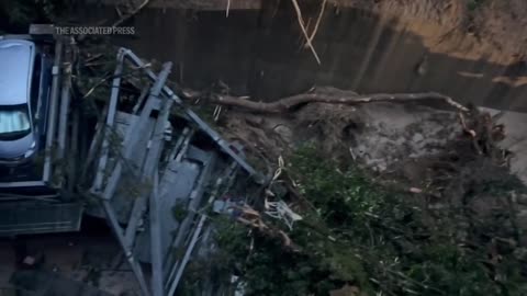 Three reported missing after landslide in western Japan.mp4