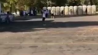 Music guy holding inflatable palm tree dancing