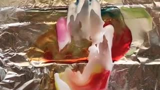 Melting Wax Hands with a Torch
