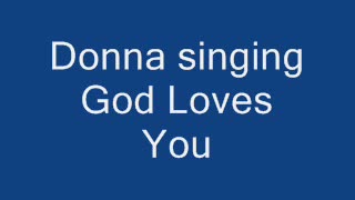 Donna singing God Loves You