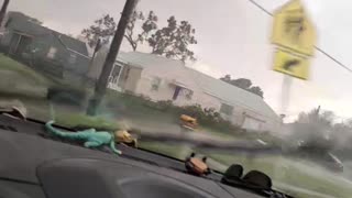 Strong Winds Blow Debris Across Road in Kansas