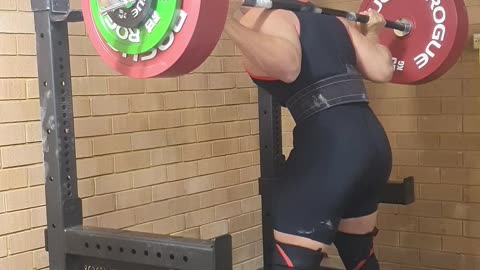 Epic fails: Powerlifter sent flying by squat rack